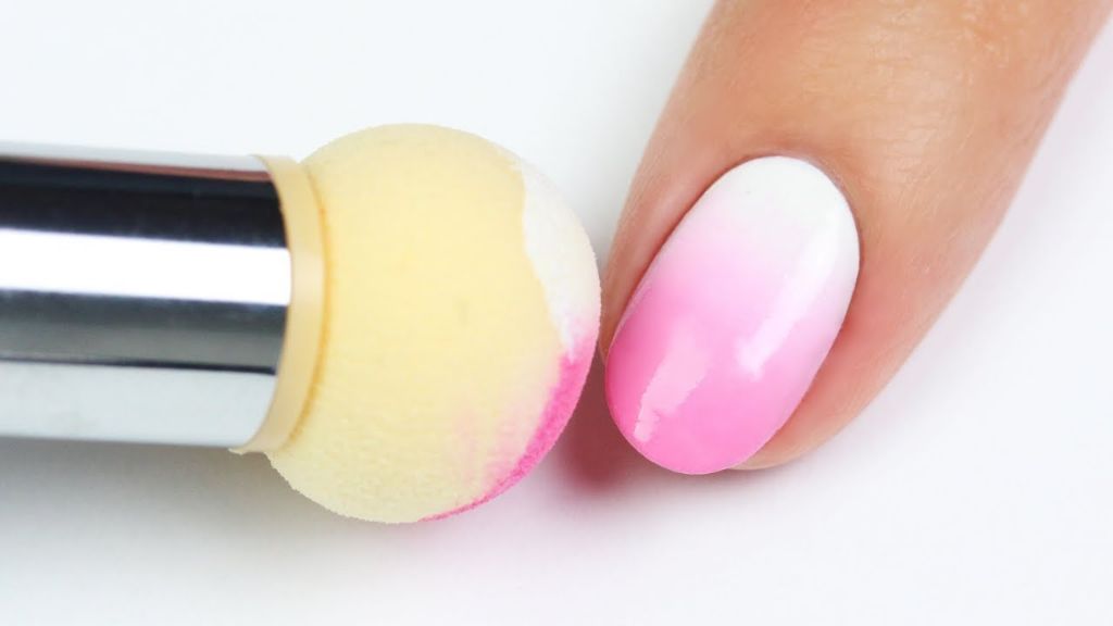 a makeup sponge and nail polish brush are two tools that can help blend ombre nail colors.