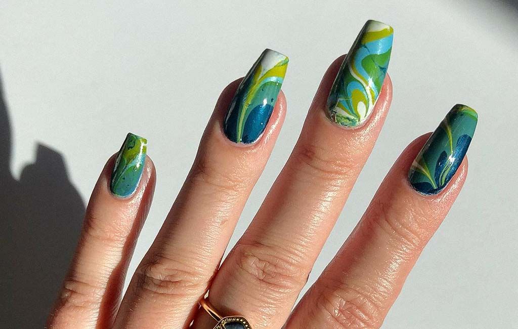 basic water marble supplies include nail polish, water, and toothpicks to swirl the polish.