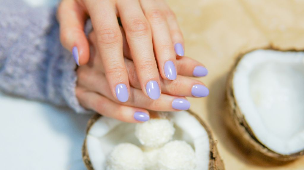 coconut oil is able to easily absorb nail polish without much scrubbing needed.