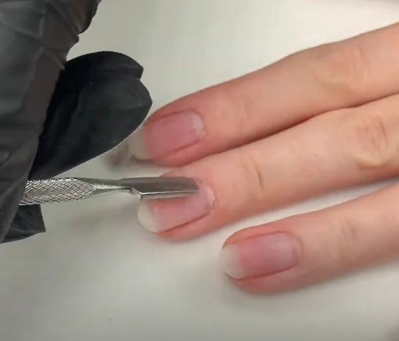properly prepping the nails is a crucial first step before applying extensions or polish to long nails.